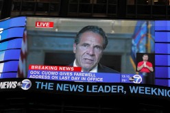 A farewell speech by New York Governor Andrew Cuomo is broadcast live on a screen in Times Square on his final day in office in Manhattan, New York City, U.S
