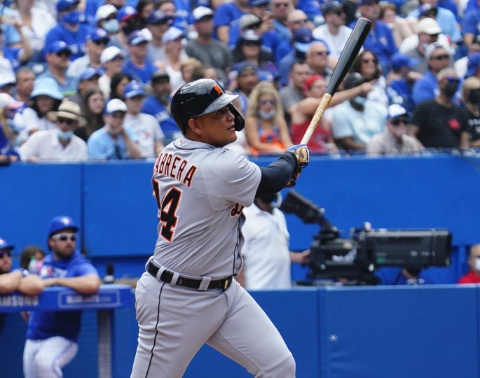 Aug 22, 2021; Toronto, Ontario, CAN; Detroit Tigers designated hitter Miguel Cabrera (24) hits a solo homerun against the Toronto Blue Jays in the sixth inning at Rogers Centre
