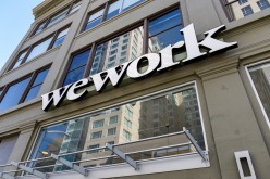 A WeWork logo is seen outside its offices in San Francisco, California, U.S