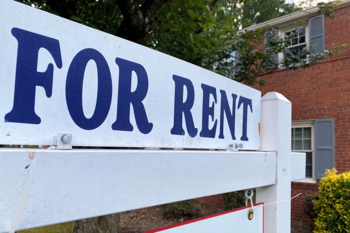 A "For Rent" sign is placed in front of a home in Arlington, Virginia, U.S.,