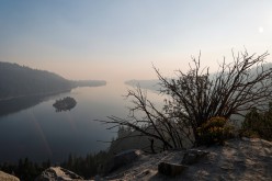 A view from Emerald Bay towards Lake Tahoe is obscured by smoke from the Caldor Fire viewed from Georgetown, California, U.S