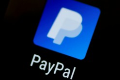 The PayPal app logo seen on a mobile phone in this illustration photo