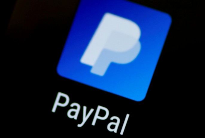 The PayPal app logo seen on a mobile phone in this illustration photo