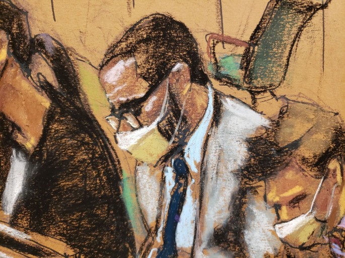 R. Kelly sits with his defense lawyers Nicole Blank Becker and Thomas Farinella during his sex abuse trial at Brooklyn's Federal District Court in a courtroom sketch in New York, U.S.