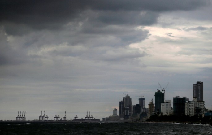 A general view of the main business district as rain clouds gather above in Colombo, Sri Lanka,
