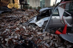 A destroyed car is seen under the debris of a building after Hurricane Ida made landfall in Louisiana, U.S