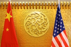 Chinese and U.S. flags are set up for a meeting at China's Ministry of Transport in Beijing, China