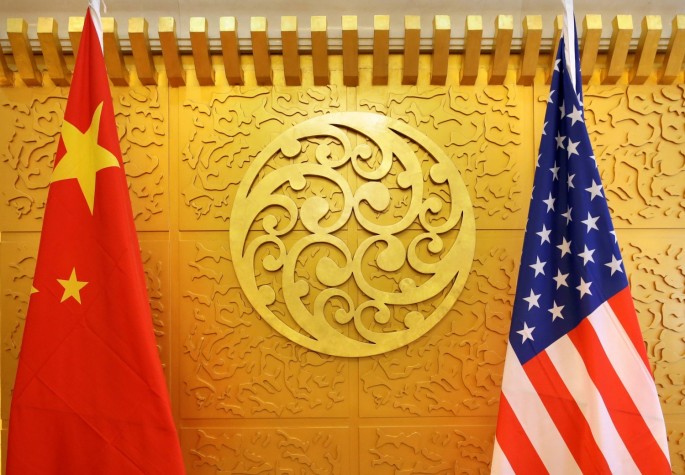 Chinese and U.S. flags are set up for a meeting at China's Ministry of Transport in Beijing, China