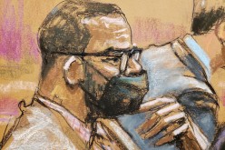 R. Kelly sits in court during his sex abuse trial at Brooklyn's Federal District Court in a courtroom sketch in New York, U.S.