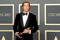 Best Supporting Actor Brad Pitt poses with the Oscar in the photo room during the 92nd Academy Awards in Hollywood, Los Angeles, California, U.S.