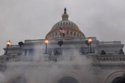 Police clear the U.S. Capitol Building with tear gas as supporters of U.S. President Donald Trump gather outside, in Washington, U.S
