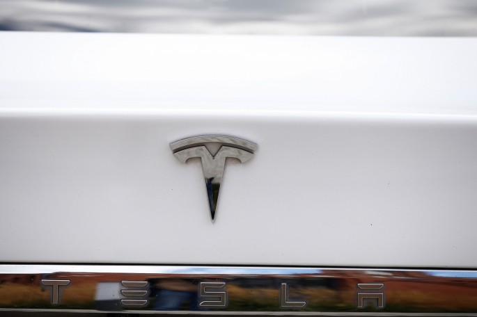The logo of Tesla cars logo is seen during the presentation of the new charge system in the EUREF campus in Berlin, Germany