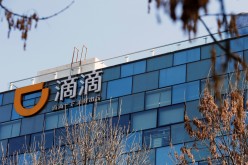 A Didi logo is seen at the headquarters of Didi Chuxing in Beijing, China