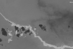 A black and white satellite image shows an oil slick following Hurricane Ida, south of Port Fourchon, Louisiana, U.S.