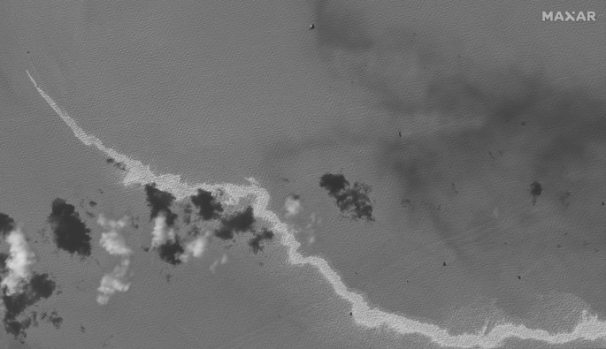 A black and white satellite image shows an oil slick following Hurricane Ida, south of Port Fourchon, Louisiana, U.S.