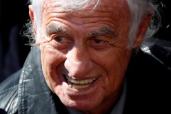 Actor Jean-Paul Belmondo attends a national tribute for late singer Charles Aznavour during a ceremony at the Hotel des Invalides in Paris, France