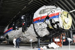 Lawyers attend the judges' inspection of the reconstruction of the MH17 wreckage, as part of the murder trial ahead of the beginning of a critical stage, in Reijen
