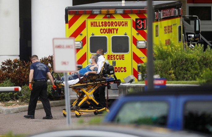Hillsborough County Rescue first responders admit a patient to the emergency room at St. Joseph’s Hospital amid a coronavirus disease (COVID-19) outbreak in Tampa, Florida, U.S.