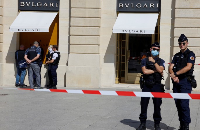 French police stand in front of the Bulgari jewellery store following a robbery at Place Vendome in Paris, France,