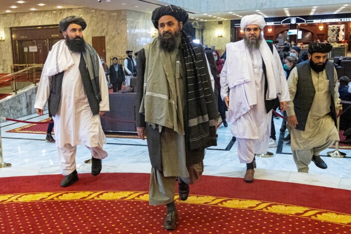 Mullah Abdul Ghani Baradar, the Taliban's deputy leader and negotiator, and other delegation members attend the Afghan peace conference in Moscow, Russia
