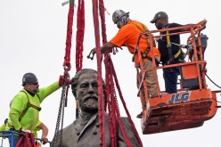 Workers prepare to remove the statue of Confederate General Robert E. Lee, after the Virginia Supreme Court unanimously ruled that the state can take it down, in Richmond, Virginia, U.S
