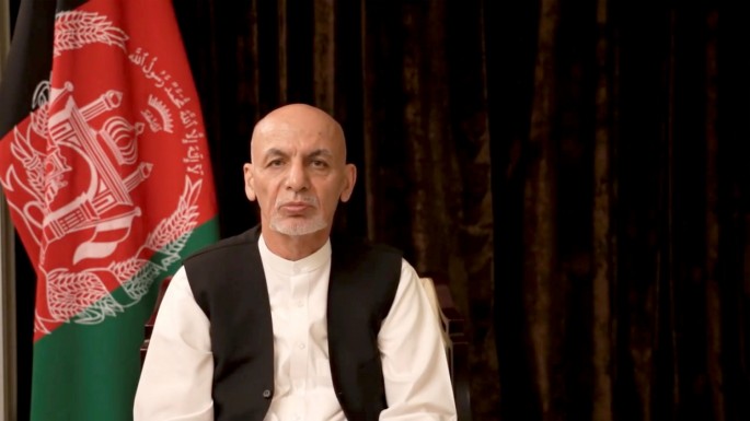 Afghan President Ashraf Ghani makes an address about the latest developments in the country from exile in United Arab Emirates, in this screen grab obtained from a social media video