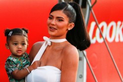 Kylie Jenner and her daughter Stormi Webster share a moment at the premiere for the documentary 