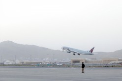 The first international flight since the withdrawal of U.S. troops from Afghanistan takes off from the international airport in Kabul, Afghanistan, 