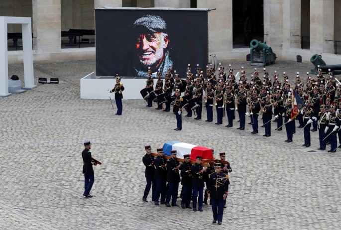 French Republican guards carry the flag-draped coffin of late actor Jean-Paul Belmondo during a ceremony and a national tribute at the Hotel des Invalides in Paris, France
