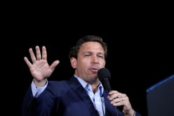 FILE PHOTO: Florida Governor Ron Desantis speaks during a campaign rally by U.S. President Donald Trump at Pensacola International Airport in Pensacola, Florida, U.S