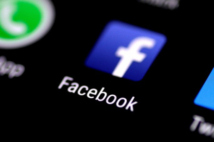 FILE PHOTO: The Facebook app is seen on a phone screen 