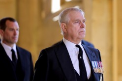 Britain's Britain's Prince Andrew, Duke of York, looks on during the funeral of Britain's Prince Philip, husband of Queen Elizabeth, who died at the age of 99, on the grounds of Windsor Castle in Windsor, 