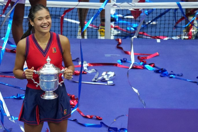 Sep 11, 2021; Flushing, NY, USA; Emma Raducanu of Great Britain celebrates with the championship trophy after her match against Leylah Fernandez of Canada (not pictured)