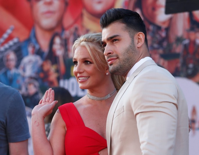 Britney Spears and Sam Asghari pose at the premiere of "Once Upon a Time In Hollywood" in Los Angeles, California, U.S.