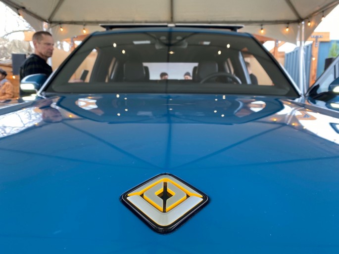 The logo for electric vehicle startup Rivian is seen on the hood of its new R1T all-electric truck in Mill Valley, California, U.S.