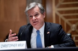 FBI Director Christopher Wray testifies during a Senate Homeland Security and Governmental Affairs hearing to discuss security threats 20 years after the 9/11 attacks, in Washington, D.C., U.S