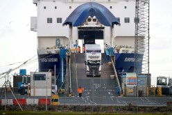 Lorries leave a ferry at the Port of Larne, Northern Ireland Britain 