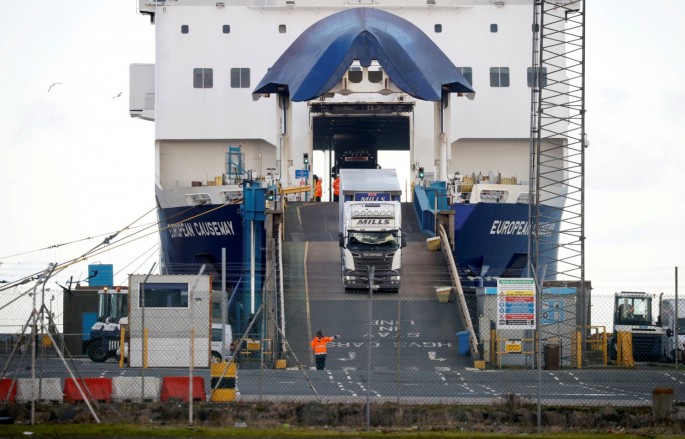 Lorries leave a ferry at the Port of Larne, Northern Ireland Britain 