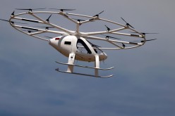 A prototype of an electrical air-taxi drone by German start-up Volocopter that takes off and lands vertically performs a non-passenger flight over Le Bourget airport, near Paris, France