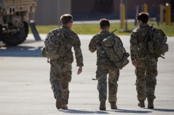 Soldiers from the 4th Battalion, 31st Infantry Regiment, 2nd Brigade Combat Team of the 10th Mountain Division, walk together after returning home from deployment in Afghanistan, at Fort Drum,