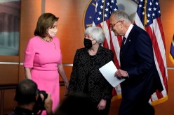 Senate Majority Leader Chuck Schumer finishes making a statement in attendance with Treasury Secretary Janet Yellen and U.S. House Speaker Nancy Pelosi (D-CA) before the start of Pelosi's weekly news conference on Capitol Hill in Washington, U.S.