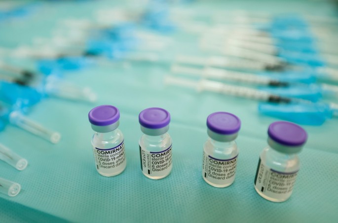 Vials and syringes filled with the "Comirnaty" Pfizer BioNTech vaccine against the coronavirus disease (COVID-19) are seen on a table at a nursing home in Seville,