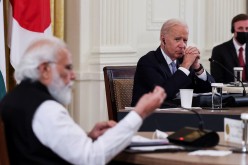 U.S. President Joe Biden listens as India's Prime Minister Narendra Modi speaks during a 'Quad nations' meeting at the Leaders' Summit of the Quadrilateral Framework held in the East Room at the White House in Washington, U.S., 