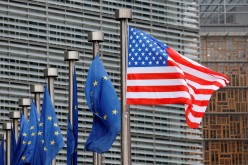 U.S. and European Union flags are pictured during the visit of Vice President Mike Pence to the European Commission headquarters in Brussels, Belgium
