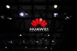 A Huawei logo is seen at the Mobile World Congress (MWC) in Shanghai, China