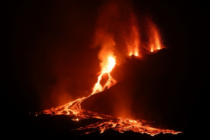 Lava and smoke rise following the eruption of a volcano on the Canary Island of La Palma, in Todoque, Spain