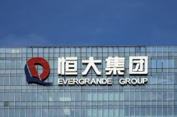 The company logo is seen on the headquarters of China Evergrande Group in Shenzhen, Guangdong province, China 
