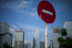 A No Entry traffic sign stands near the headquarters of China Evergrande Group in Shenzhen, Guangdong province, China