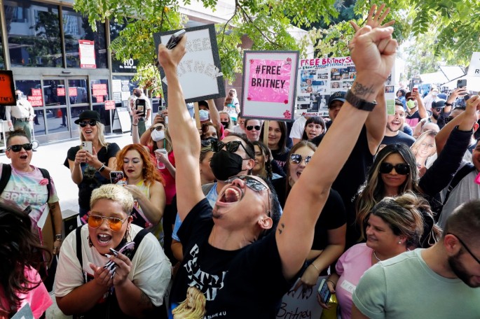 Supporters of pop star Britney Spears celebrate after a judge suspended the father of?Britney?Spears from his 13-years-long role as the controller of the singer's business affairs at Stanley Mosk Courthouse in Los Angeles, California, U.S., 