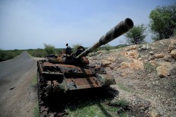 A tank damaged during the fighting between Ethiopia's National Defense Force (ENDF) and Tigray Special Forces stands on the outskirts of Humera town in Ethiopia